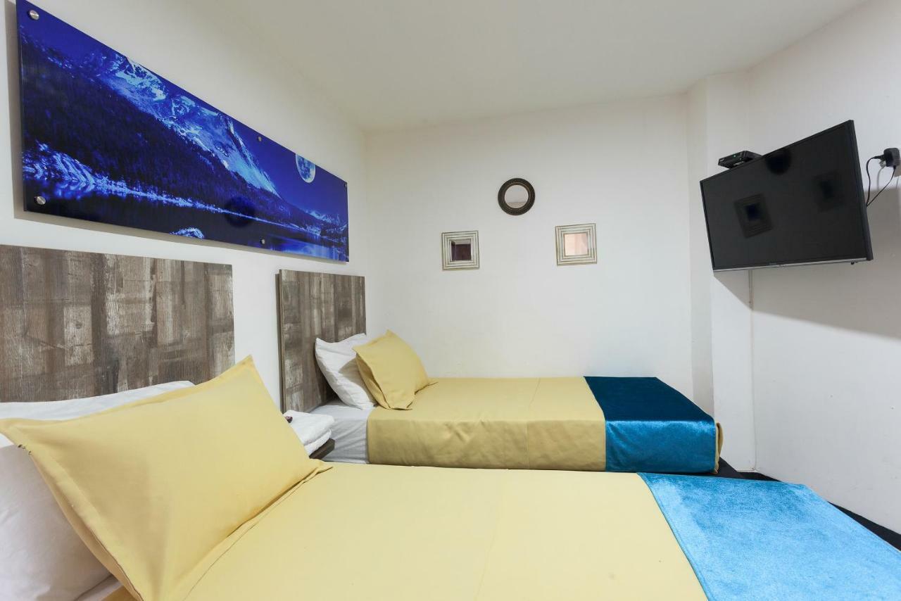 Apartamentos Amoblados Jg De La 70 Medellin Bagian luar foto